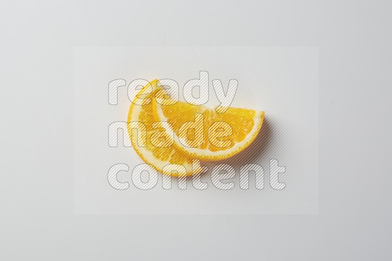 Two halves of an orange slices on white background