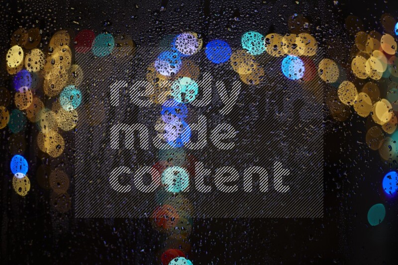 Bokeh light in multicolor with water drops