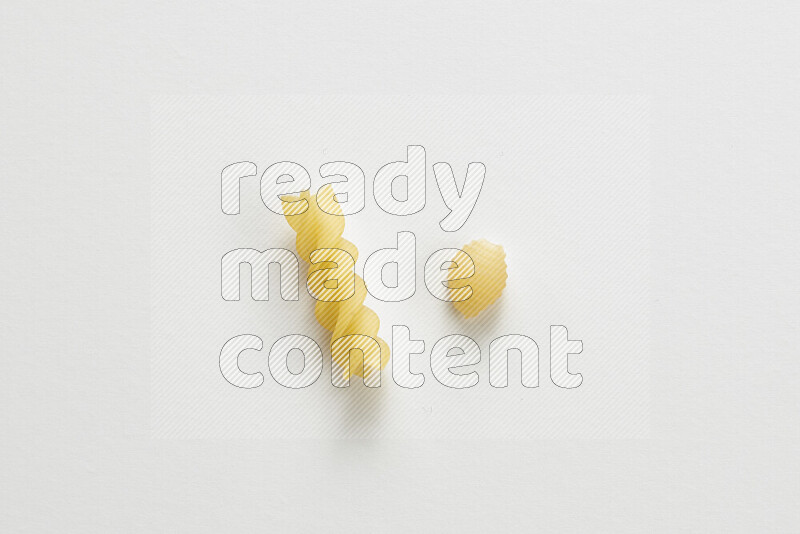 Different pasta types on white background