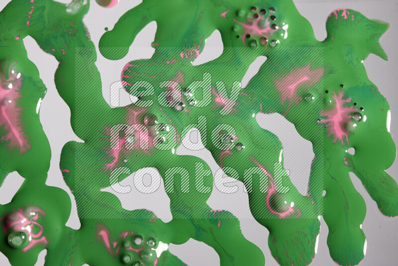 Abstract colorful background with mixed of pink and green paint colors