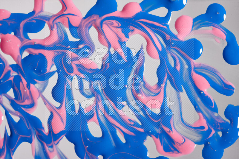 Abstract colorful background with mixed of pink and blue paint colors