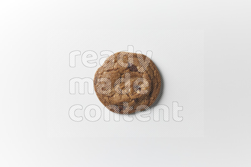 A single chocolate chips cookie on a white background