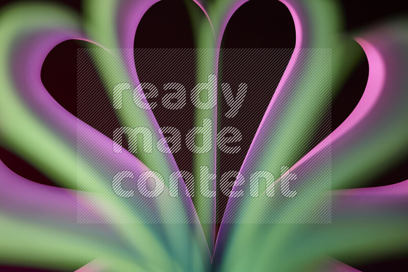 فن تجريدي يعرض منحنيات وتدرجات اللون الوردي والأخضر مكونه بضوء ملون