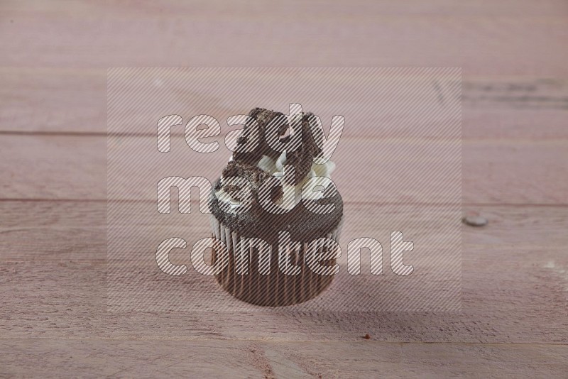 Chocolate mini cupcake topped with oreo