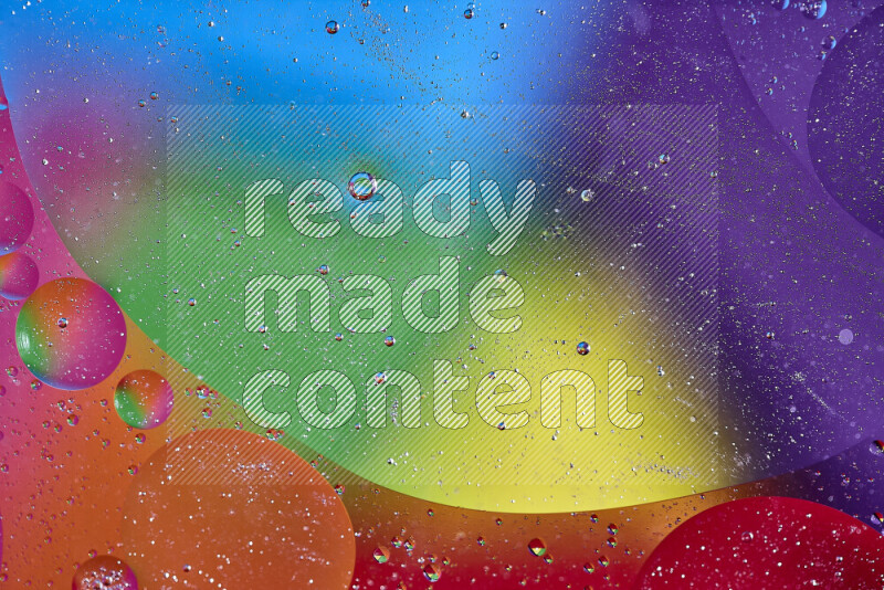 Close-ups of abstract oil bubbles on water surface in multicolors