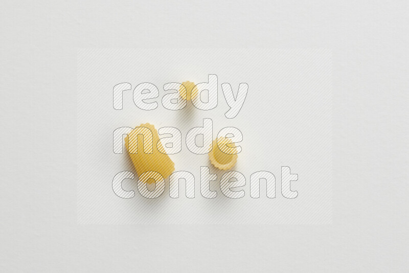 Different pasta types on white background