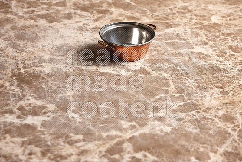 Small Copper Pot on Beige Marble Flooring, 45 degrees