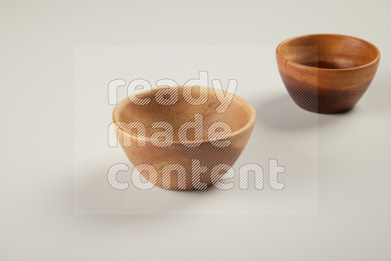 Wooden bowl on white background