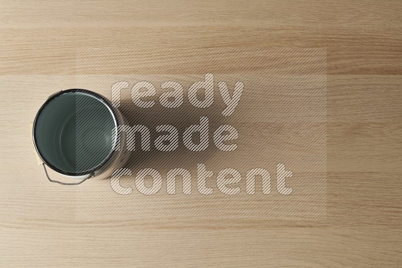 Top View Shot Of A Vintage Milk Can on Oak Wooden Flooring