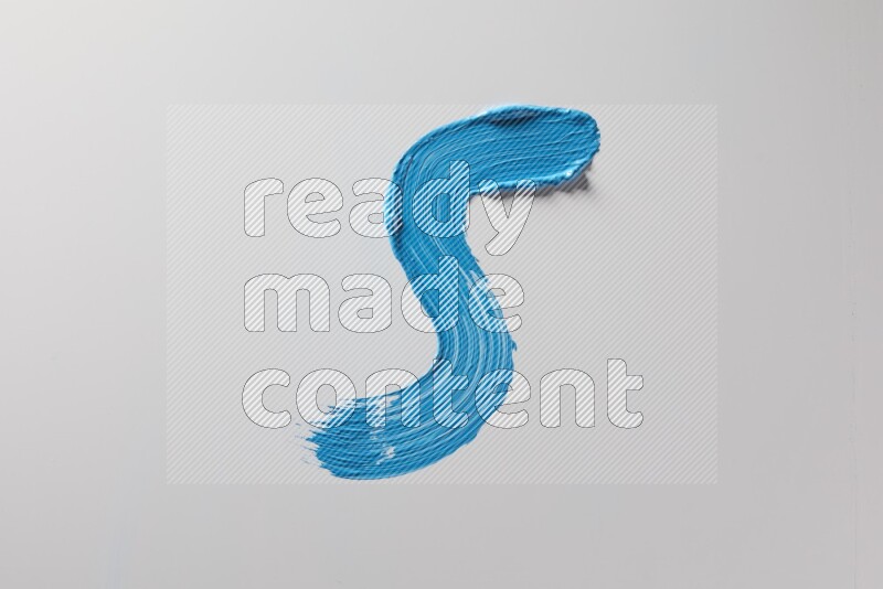 A single blue S curved brush stroke on a white background