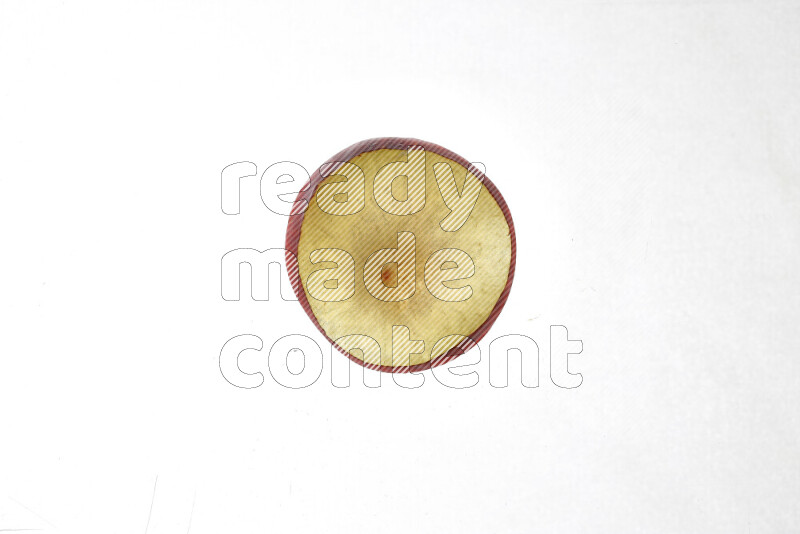 Peach slices on illuminated white background