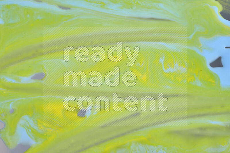 خلفية ملونة مع مزيج من ألوان الطلاء الأصفر والأزرق