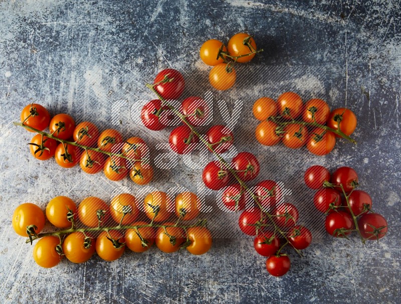 Mixed colors of cherry tomato veins topview on textured vinyl backgrounds