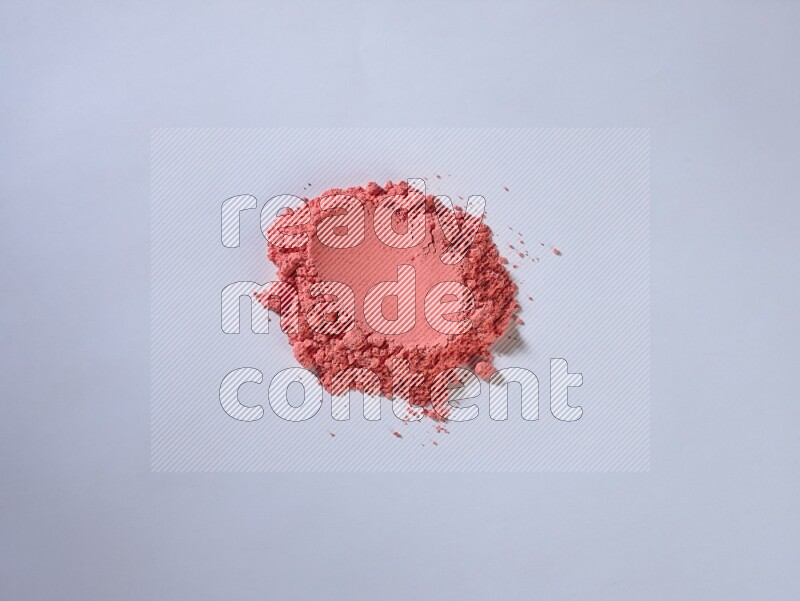Red powder on white background