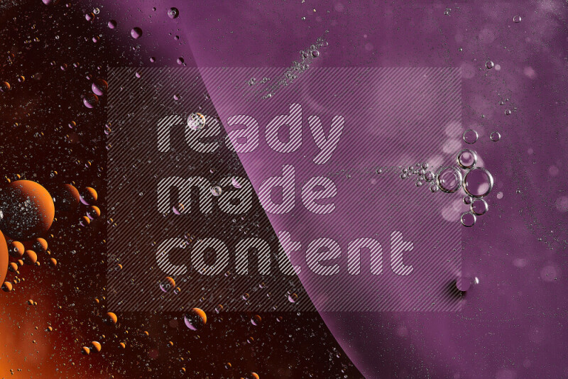 Close-ups of abstract oil bubbles on water surface in shades of orange and purple