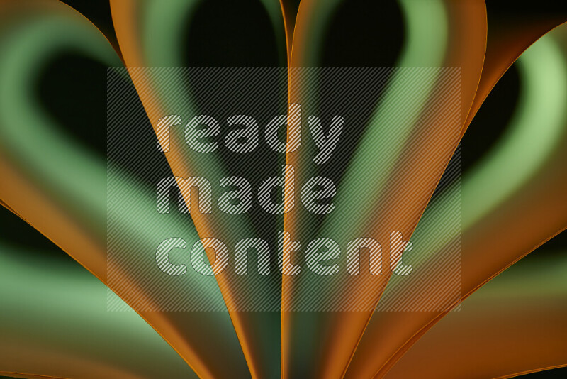 An abstract art piece displaying smooth curves in green and orange gradients created by colored light