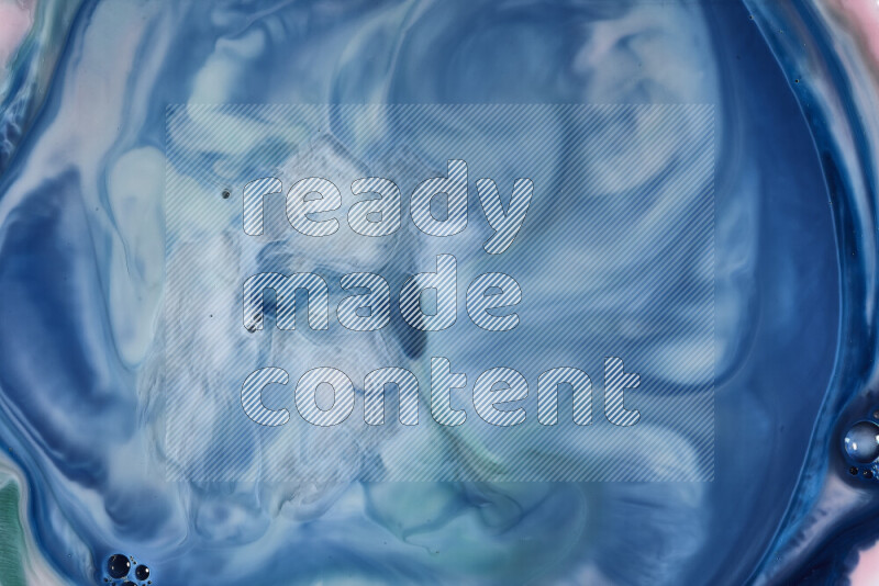 A close-up of abstract swirling patterns in blue and white