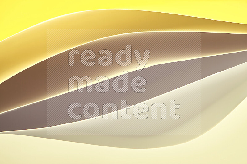 This image showcases an abstract paper art composition with paper curves in gold gradients created by colored light