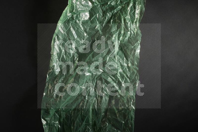 Colored plastic textures on black background