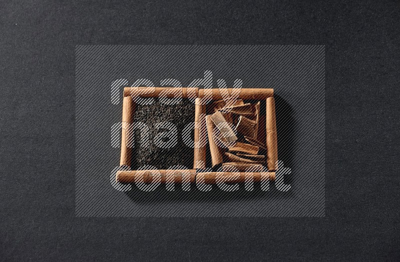 2 squares of cinnamon sticks full of tea and cinnamon on black flooring