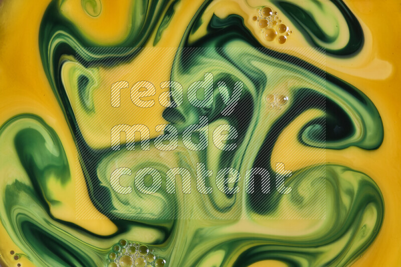 A close-up of abstract swirling patterns in orange and green