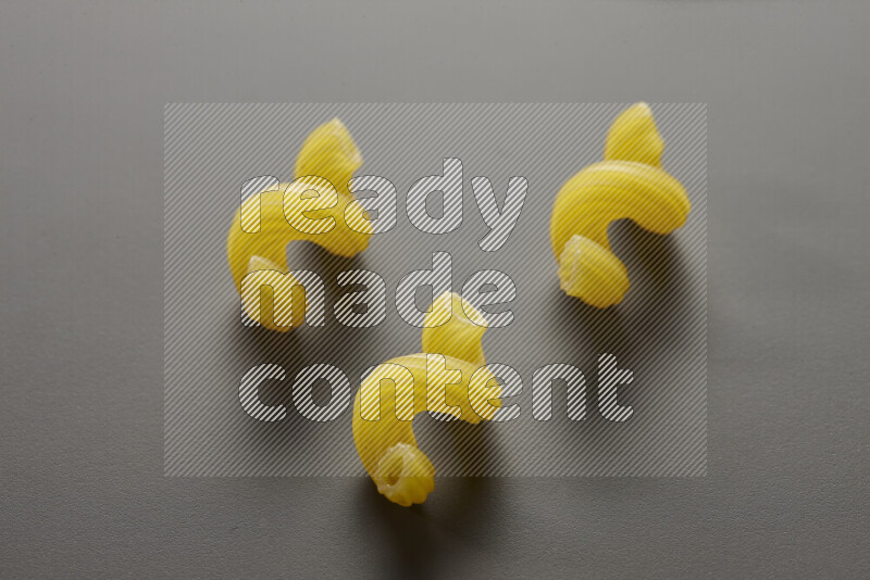 Twist pasta on grey background