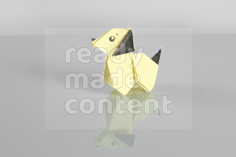 Origami animals on grey background