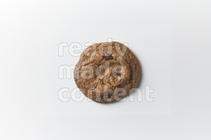 A single chocolate chips cookie on a white background