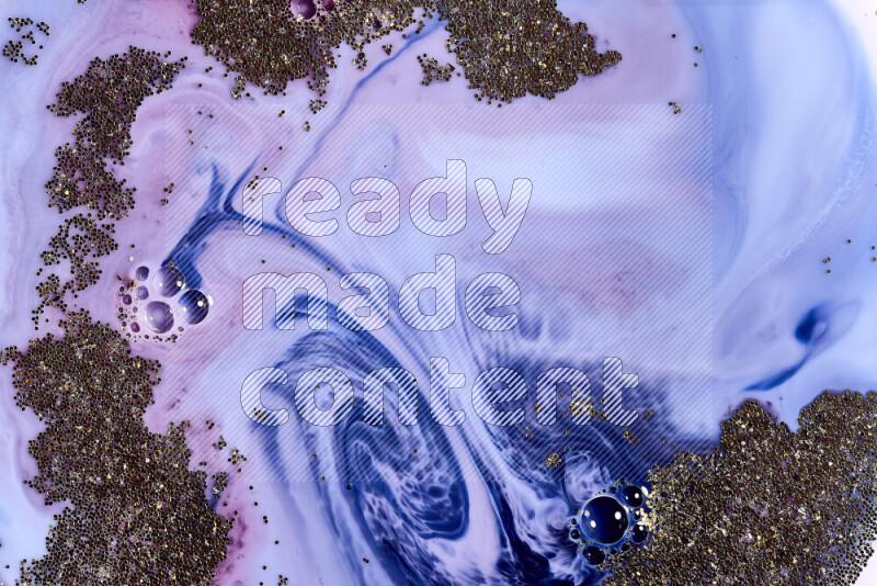 A close-up of sparkling gold glitter scattered on swirling blue and red background