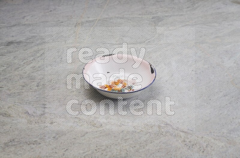A vintage metal plate on grey marble background