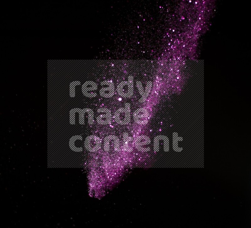 Pink glitter powder isolated on black background