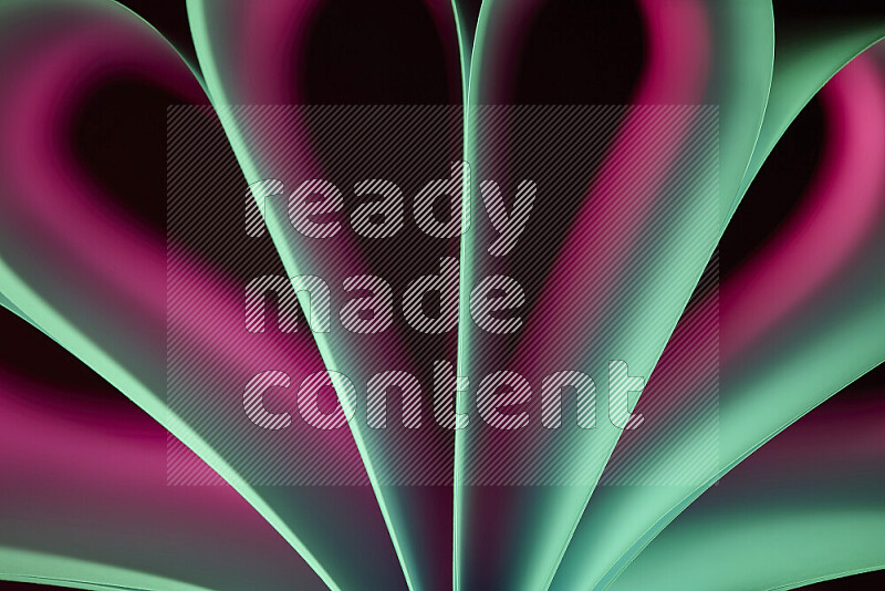 An abstract art piece displaying smooth curves in pink and green gradients created by colored light