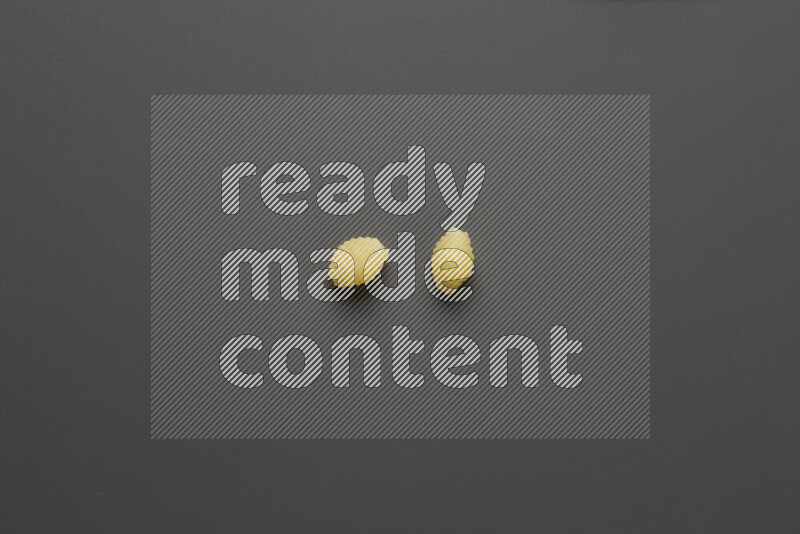 Shells pasta on grey background