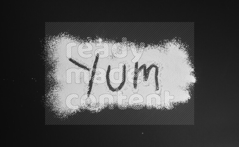 A word written with powder on black background