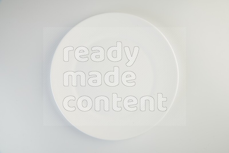 white and black plates on white background