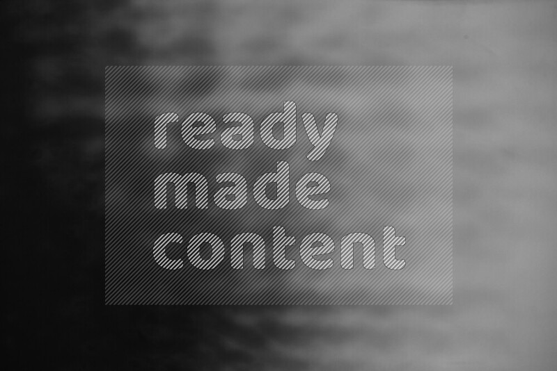 مجموعة من ضوء الغوبو الخافت تظهر أنماط هندسية علي سطح ناعم