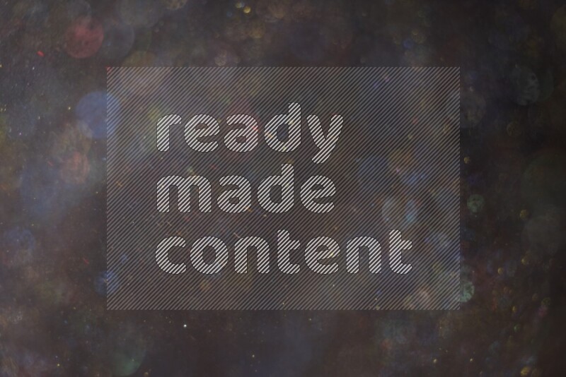 Multicolored glitter powder isolated on black background