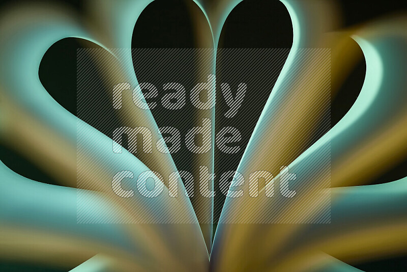 An abstract art piece displaying smooth curves in yellow and green gradients created by colored light