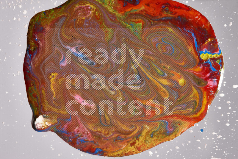 Close-ups of assorted colors blending on a grey background