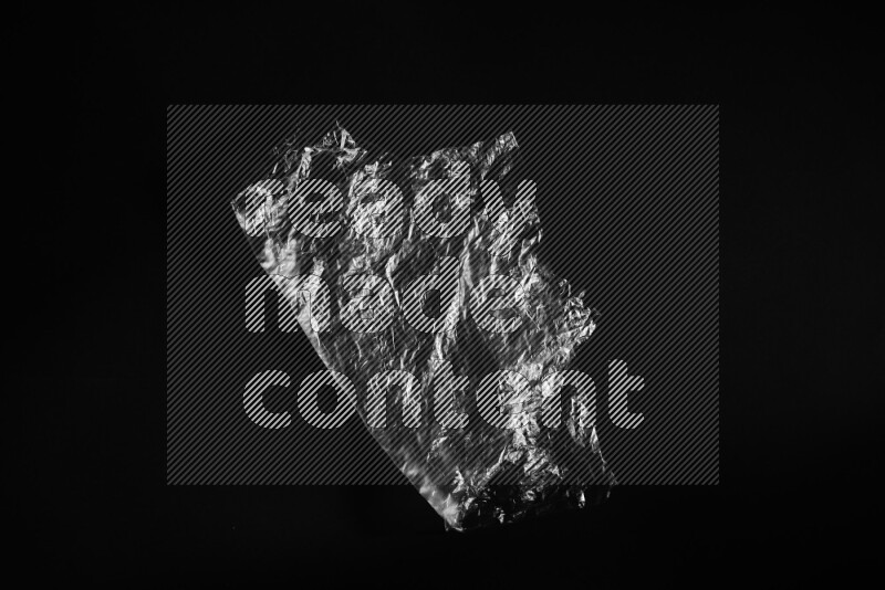 Transparent plastic textures on black background