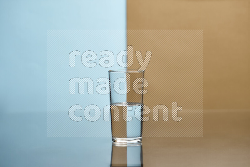 The image features a clear glassware filled with water, set against light blue and beige background