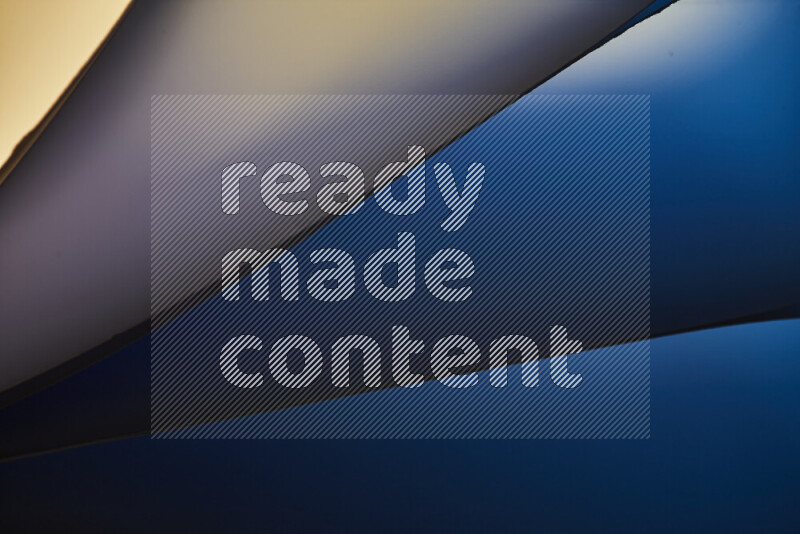 An abstract art piece displaying smooth curves in cold gradients created by colored light