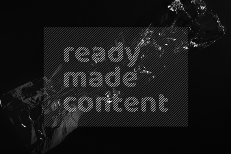 Transparent plastic textures on black background