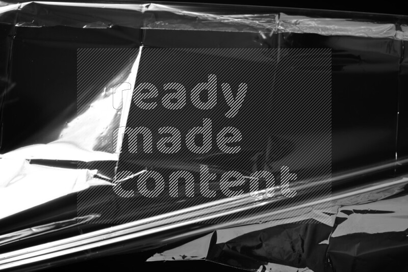 Plastic wrap texture on black background