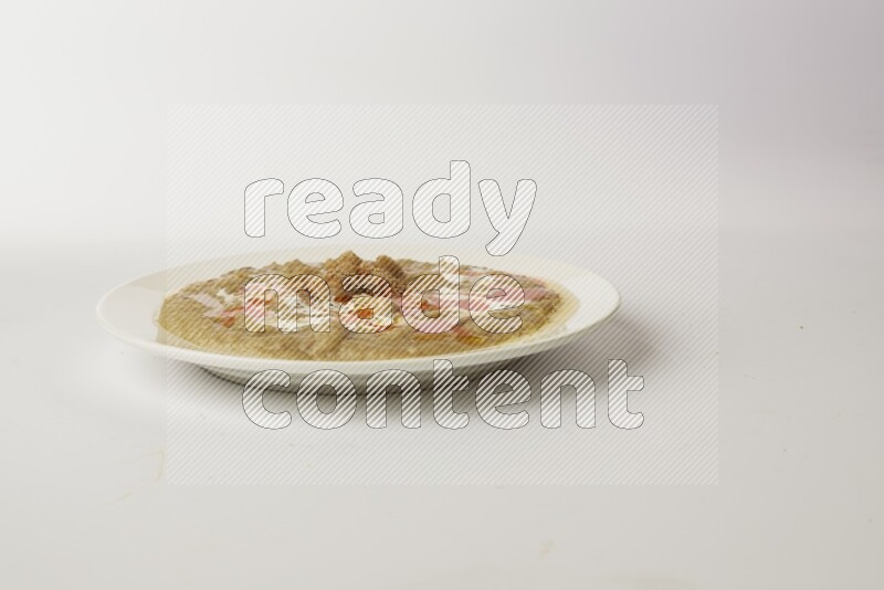 fava bean in a white plate direct on a white background
