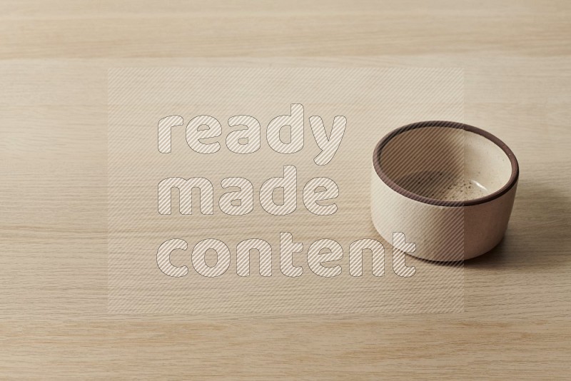 Beige Pottery Oven Bowl on Oak Wooden Flooring, 45 degrees