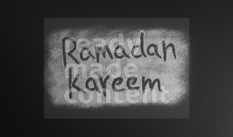 A sentence written with silver glitter on black background