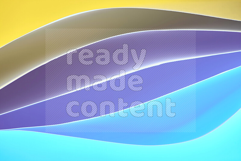 This image showcases an abstract paper art composition with paper curves in blue and yellow gradients created by colored light