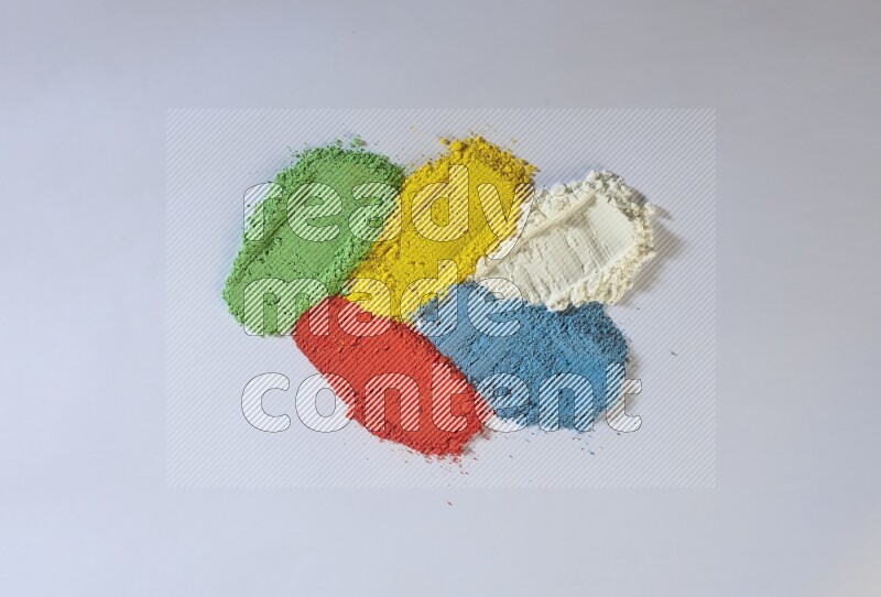 Multicolored powder strokes on white background