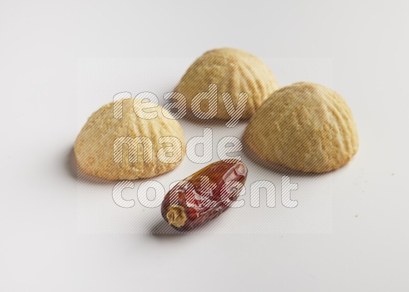 Three Pieces of Maamoul direct on white background
